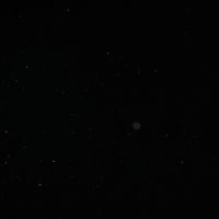 Creative abstract image of particles on a black background resembling a starry night sky.